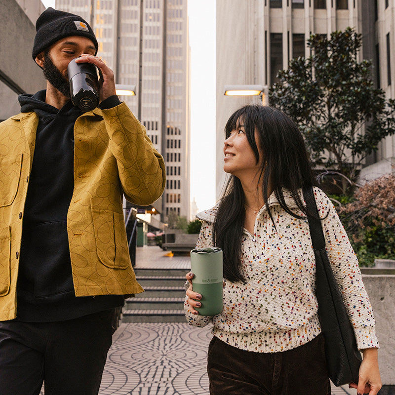bring-your-own-party-kit-pints-and-tumblers-n0 16oz_rise_tumbler_black_iceberg_couple_drink_city_street_square.jpg