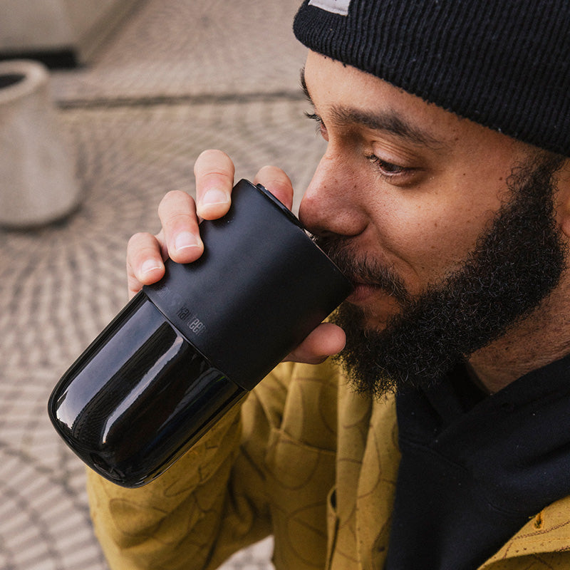 daily-on-the-go-set-z9 16oz_rise_tumbler_black_man_drink_square.jpg