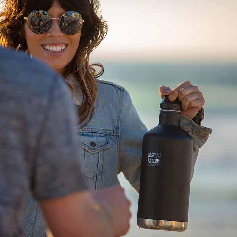 64oz-classic-with-loop-cap-z6 64oz_insulated_classic_black_beach_girl_hand_square.jpg